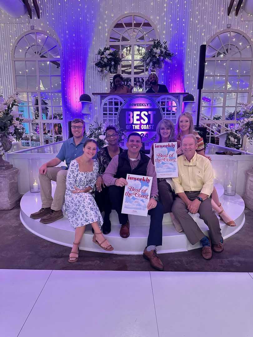 Group celebrating Best of the Coast award.
