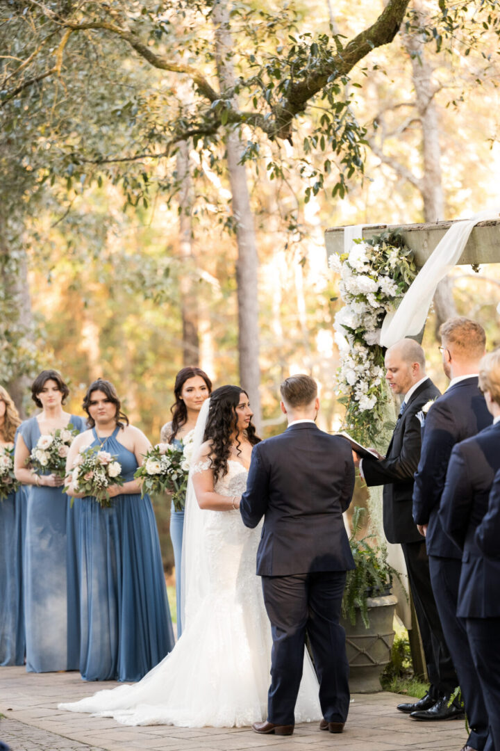 Outdoor wedding ceremony, bride and groom.