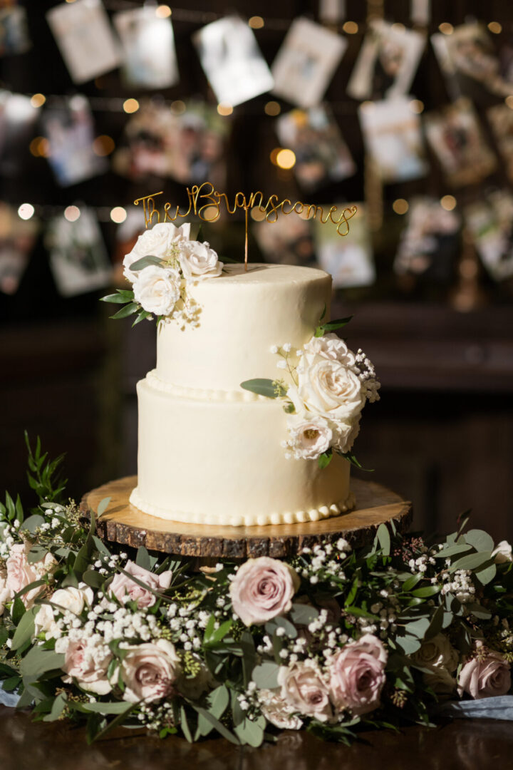 Two-tiered wedding cake with flowers.