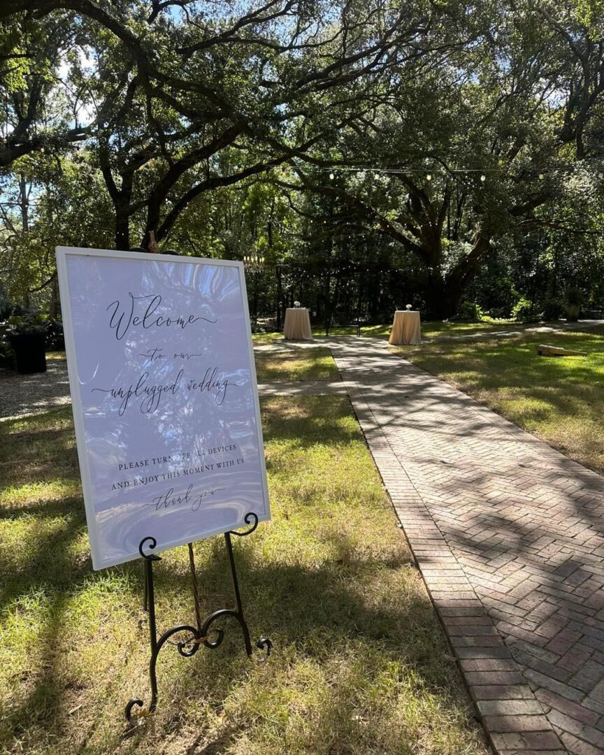 Unplugged wedding ceremony sign.