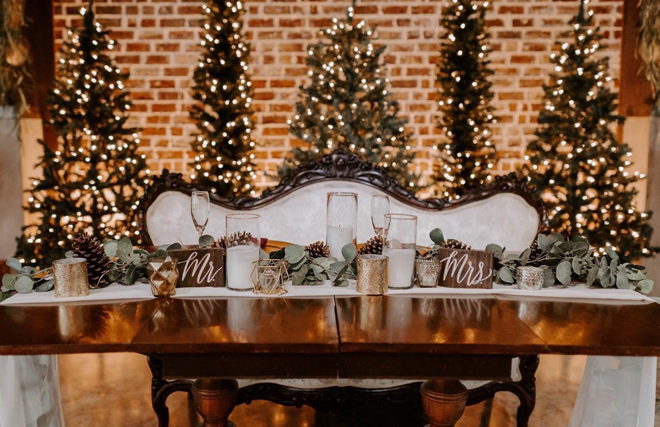 Romantic wedding sweetheart table, Christmas trees.