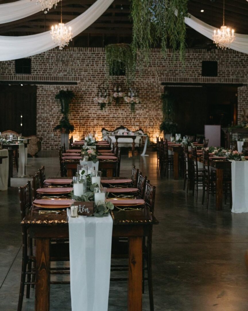 IMG_6197-53190b1 Rustic wedding reception, long tables, brick wall.