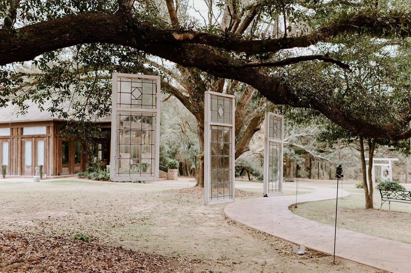 Wedding walkway with windowpane decor.