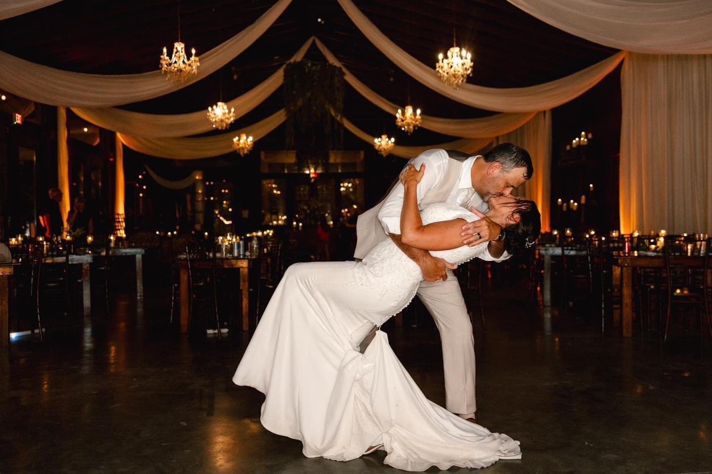 Bride and groom's first dance kiss.