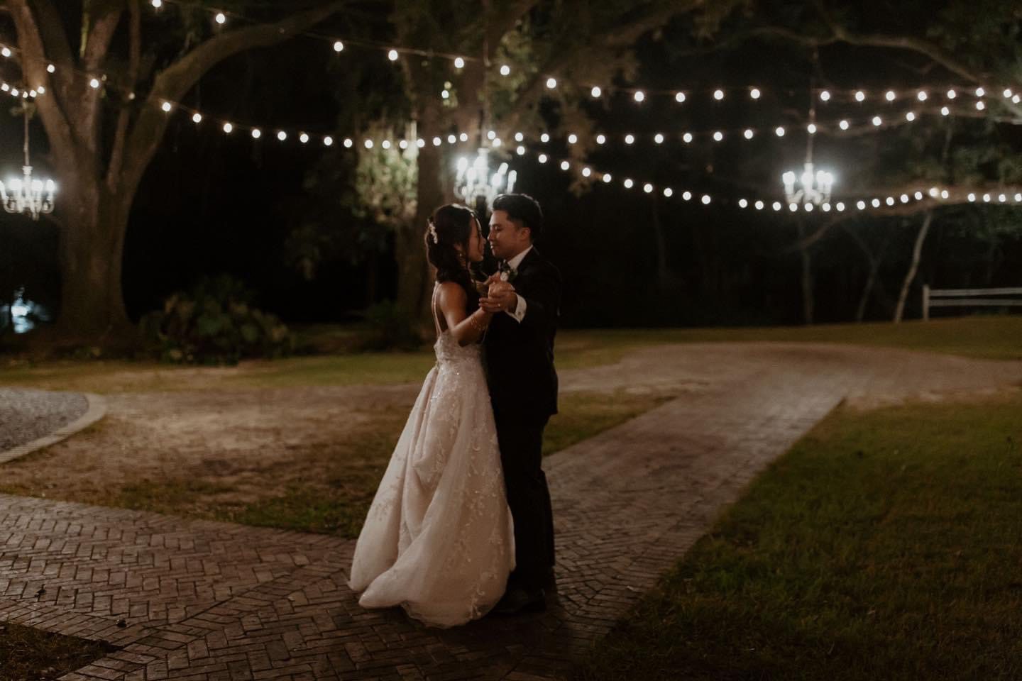 Bride and groom's first dance, night.