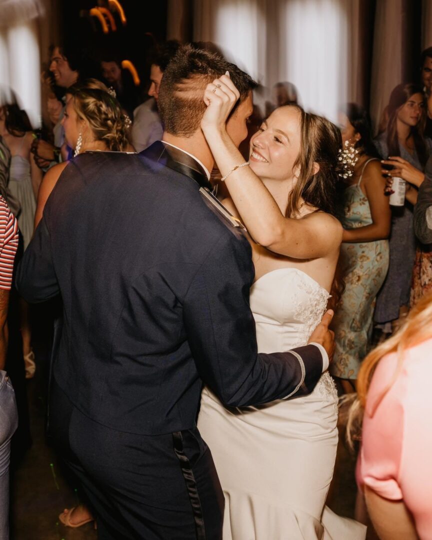 Bride and groom dance at wedding.
