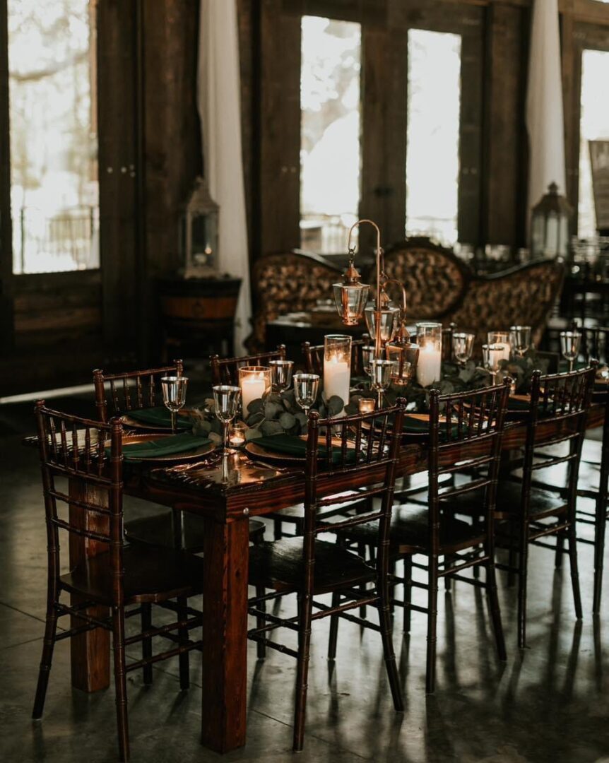 Rustic wedding table setting with candles.