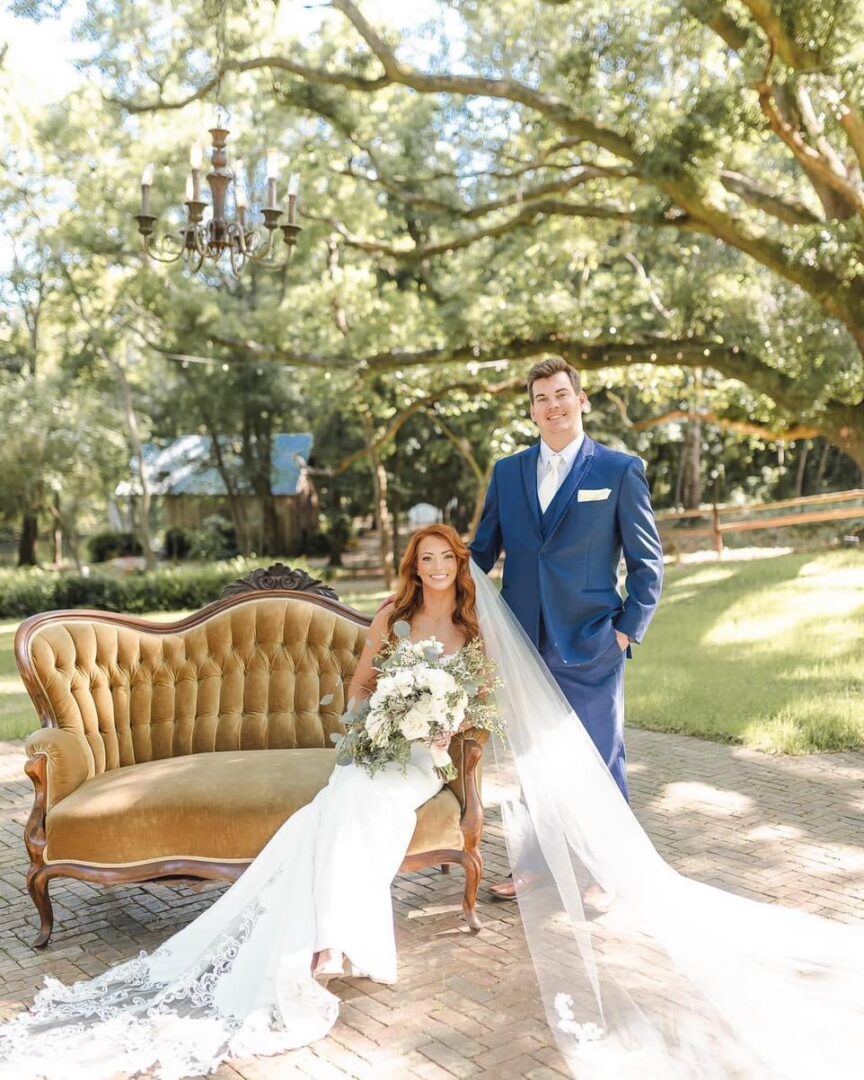 Bride and groom pose for wedding photo.