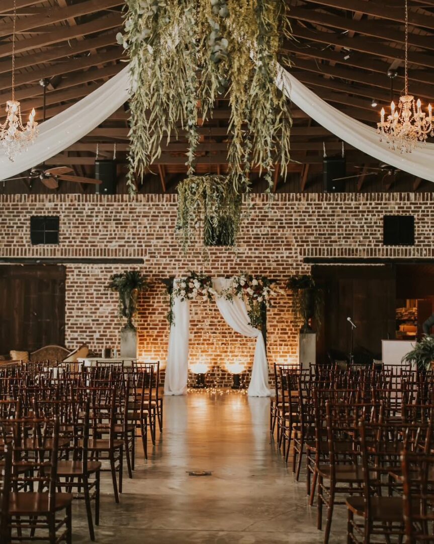 Rustic brick wedding ceremony setup.