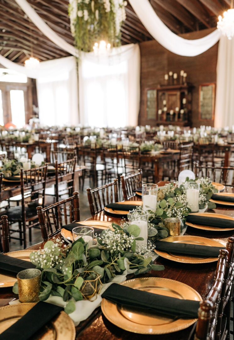 Wedding reception table decor, gold plates.