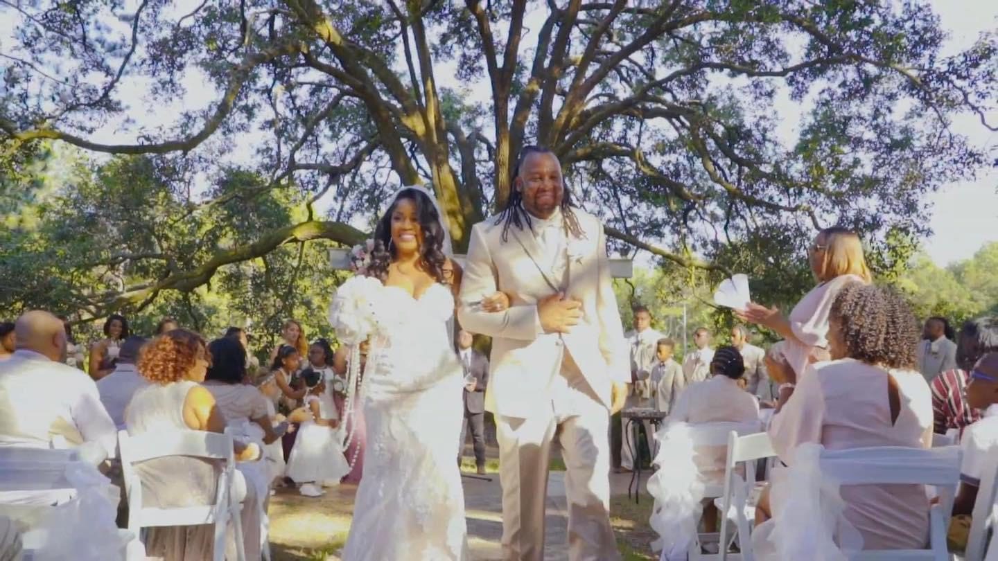 Bride and groom walking down aisle.